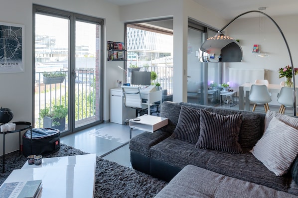 Living room opens onto dining area & covered terrace