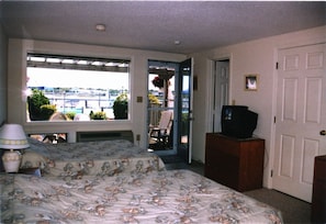 Walkout bedroom to private patio, pool and waterfront