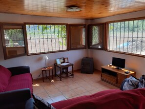 Log burning stove in the lounge area for those cooler winter months.