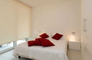 Master bedroom with doors to terrace