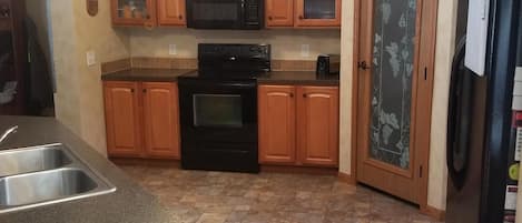 Fully furnished kitchen: coffee maker, toaster, dishes, pots & pans, utensils