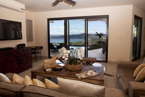 Spacious living room with amazing view of Coco Bay