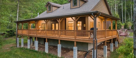 Rear of cabin with wraparound porch! 