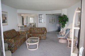 View of the living and dining room from the front balcony