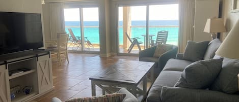 View when you walk in the door!  Large balcony overlooks the pool and ocean!  