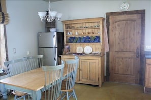 Our cozy cabin has a nice sized fridge for all your goodies and a chef's kitchen