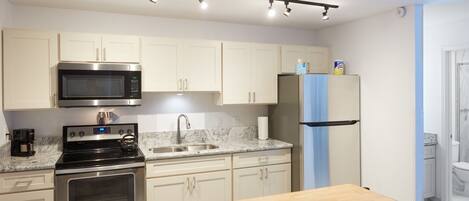 New porcelain, granite, cabinets and appliances and details.... 
