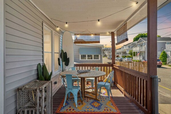 The front cottage boasts a large porch to relax, eat dinner and take in the ocean breeze.
