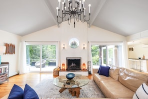 Living Room with sliding doors overlooking pool and garden