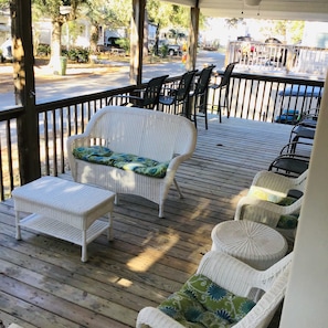 Porch view overlooking a quiet, shady street