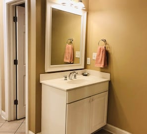 Spacious master bath has two vanities.