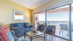 Living room and balcony together.