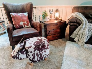 Kick your feet up on a cow ottoman! :)