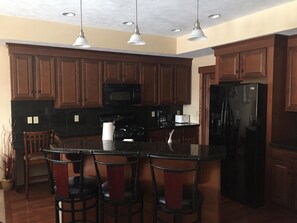 Equipped granite kitchen. Grill also available on deck.