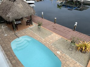 Pool , dock & water view