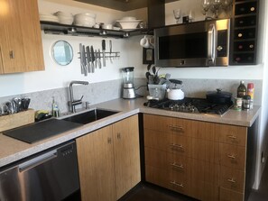 Newly remodeled kitchen with all new appliances and quartz countertops