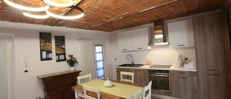 living room with fully equipped kitchen