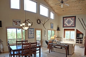 Very high vaulted ceilings in the main living and dining area