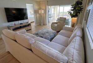 Plenty of comfortable seating to view the large 65" 4K Roku smart television.