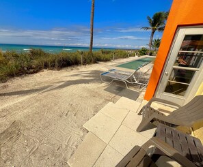 This is the optional area for beach chairs & umbrella out our porch door!