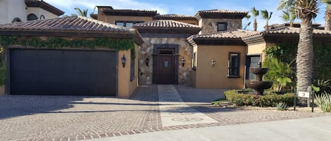 Front of house with 2 car garage