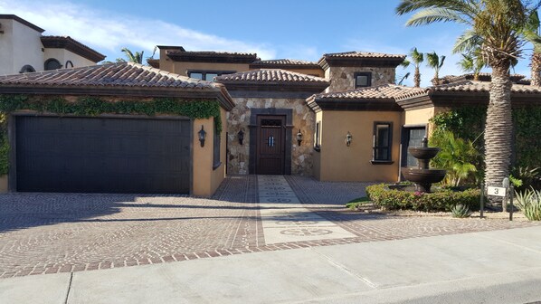 Front of house with 2 car garage