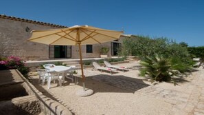 Casa Melina e Giovanni con vista del giardino da casa Melina