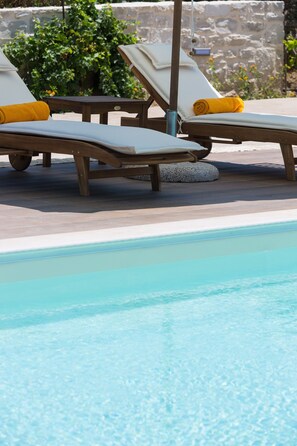 Enjoy the Greek sun and let the cool breeze take all your worries away!