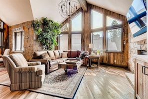 Enjoy expansive mountain views from the comfort of the great room. With its open layout and inviting fireplace, it’s the ideal space for unwinding after a day of adventure.