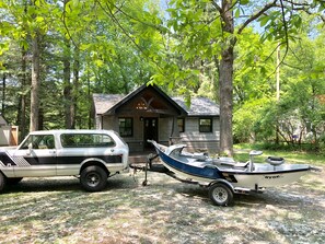 That’s ‘Lucky’ our International Scout and  the ‘African Queen’ our drift boat. 