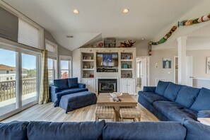 Top-Level Living Room with Deck Access