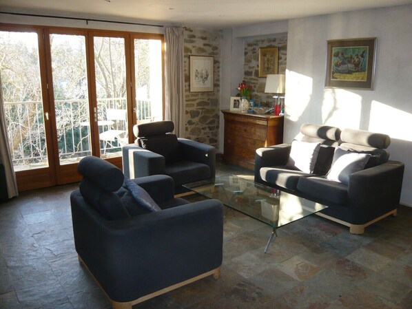 The living room with views of the river