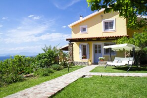 Exterior of the villa with a garden 