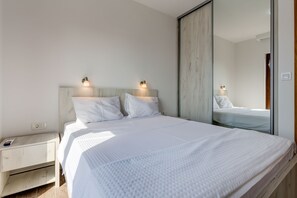Comfortable double bed for two people and a closet for all your belongings 