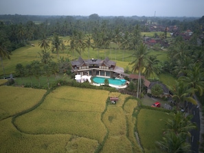 Aerial photo of Alise villa surrounded by rice paddies fields