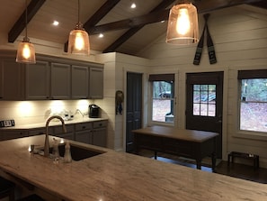 New Kitchen with beautiful granite and space for all to gather 