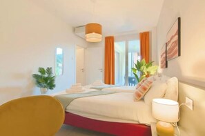 Bedroom with doors to terrace