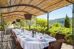 Shaded dining area overlooking Garraf Natural park. Seating for 40/60 Guests.