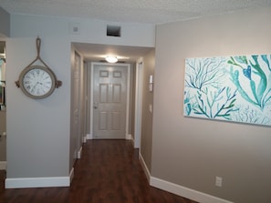Foyer with 2 closets and entrance to Guest Suite
