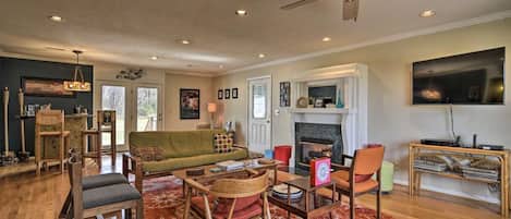 Relax in the huge living room with authentic mid-century modern furnishings.