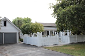 The front of the property showing the Loft to the left above the garage.