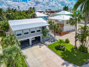 Fully landscaped with only a three minute walk to the beach.