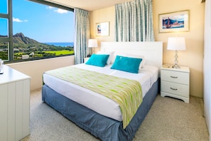 The bedroom features a King-size bed and beautiful Ocean and Diamond Head views!