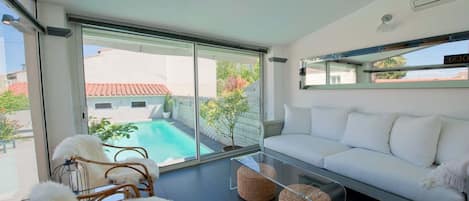 our favorite room in the house, overlooking the pool and garden, what a spot!