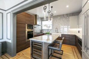 Gourmet kitchen with Wolfe appliances and Sub-Zero refrigerators. 