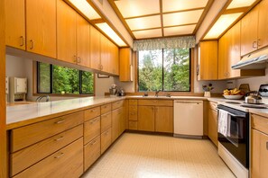 Very roomy kitchen, equipped with most everything needed for food preparation.