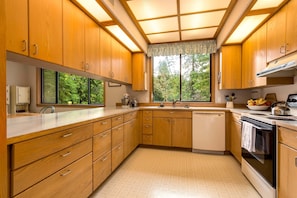 Very roomy kitchen, equipped with most everything needed for food preparation.