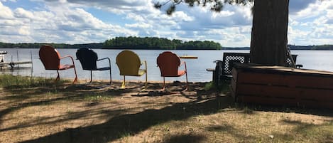 Vintage beach chairs and view of the resort swimming area.