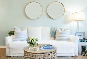 Your dreamy, single level, open floor-plan home—overlooks the tranquil pool