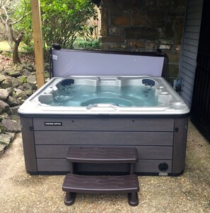 We just installed a new hot tub under the deck on the patio.  Seats eight!